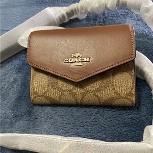 Coach Brown and Tan Signature Wallet